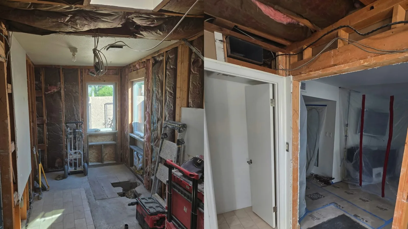 A bathroom stripped to the studs, with open wall cavities, plastic sheeting and a rolling tool case.